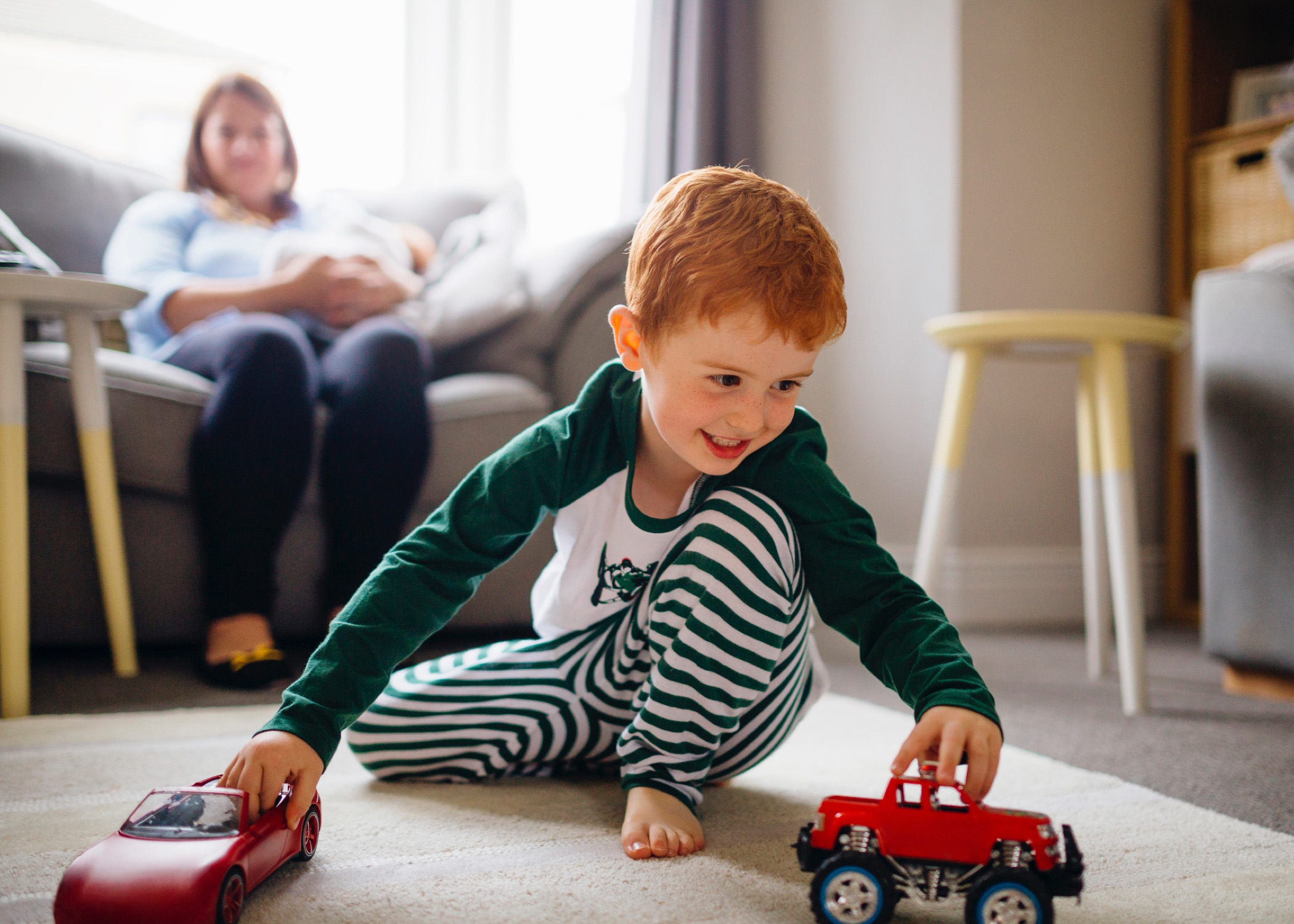 iStock image of child playing with toys, article on teaching our kids to think for themselves