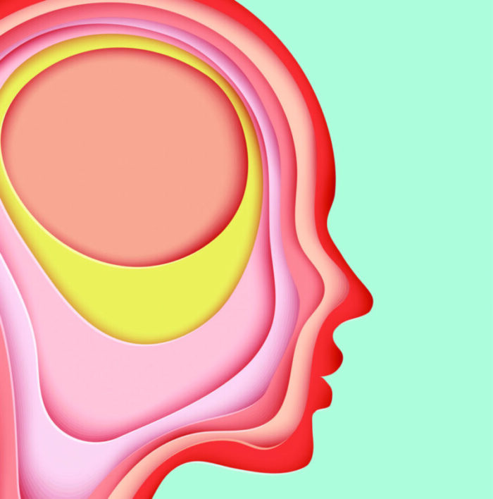 diagnosing and underdiagnosing girls with dyslexia, iStock illustration, Paper head of girl with dyslexia illustrating many complex layers