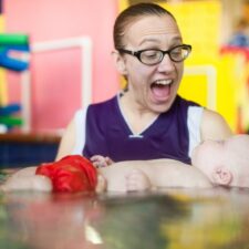 Instructor at best moms and babies winner Emler Swim School with infant student.