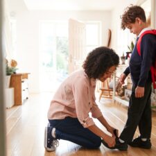 Mom getting her and son out the door in the morning