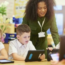 Teacher with students in classroom