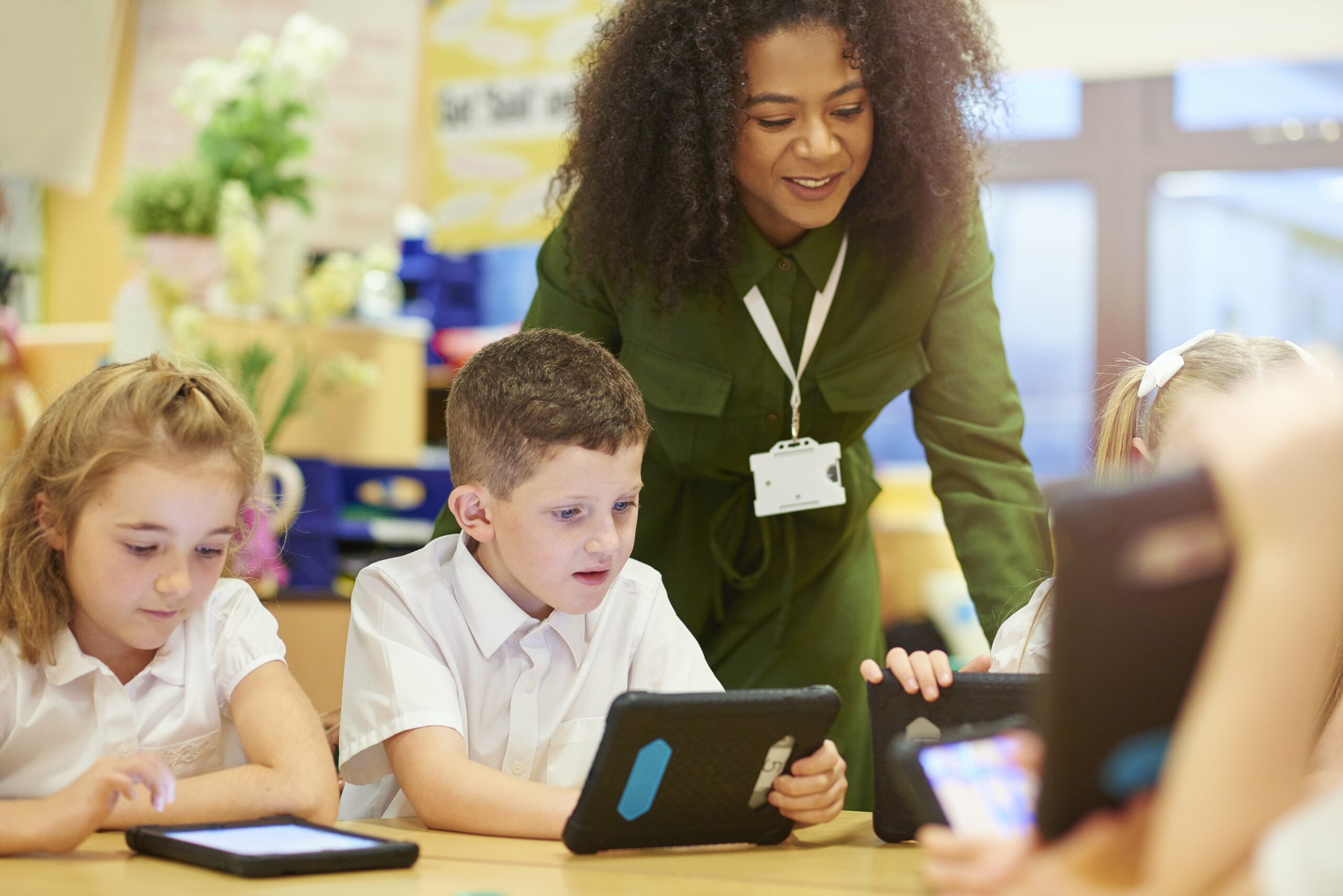 Teacher with students in classroom