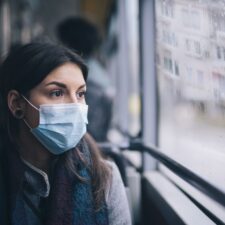 Woman wearing face mask to testing center for COVID-19