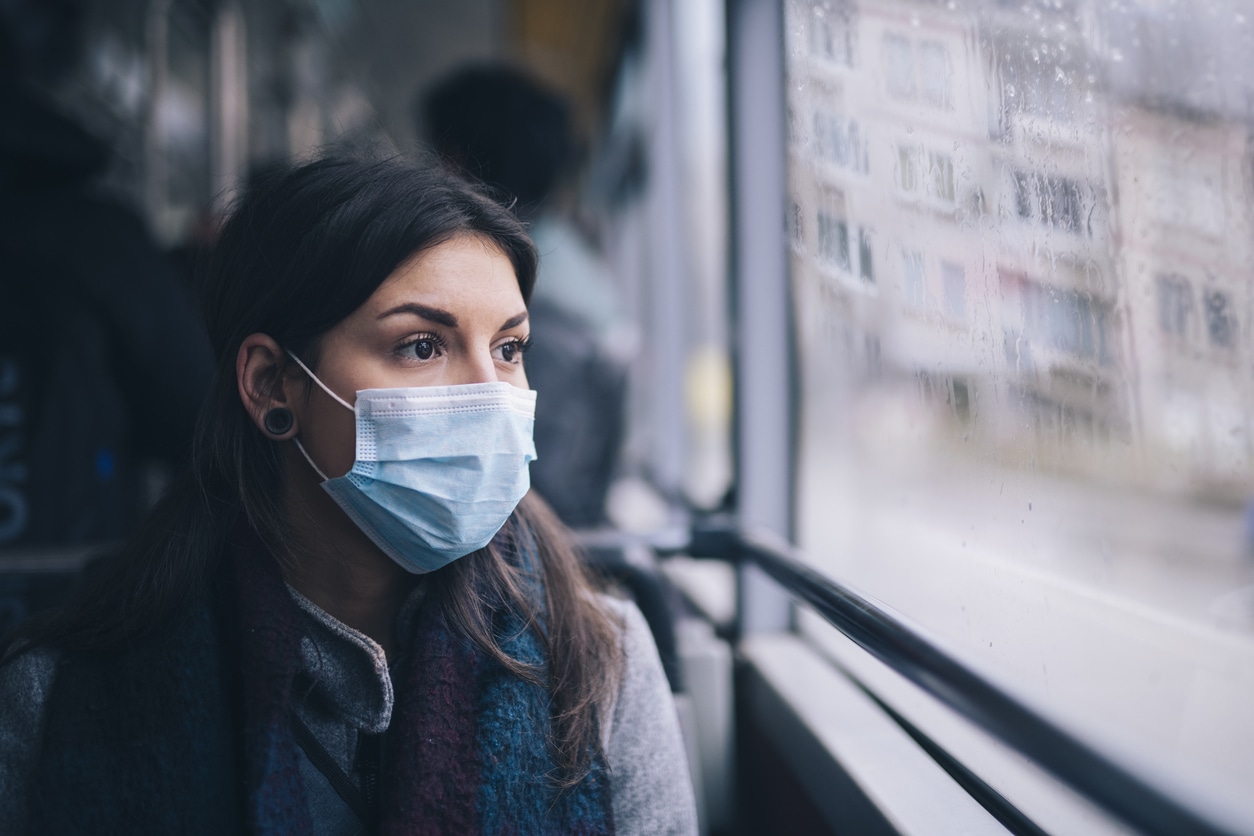 Woman wearing face mask to testing center for COVID-19