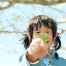 Girl playing outside in nature