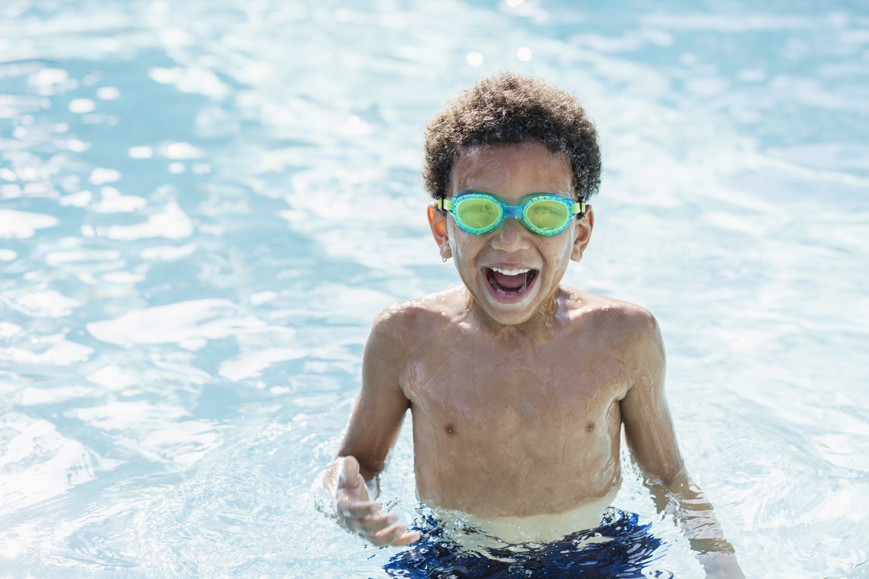 Kid swimming with pool safety and water safety rules