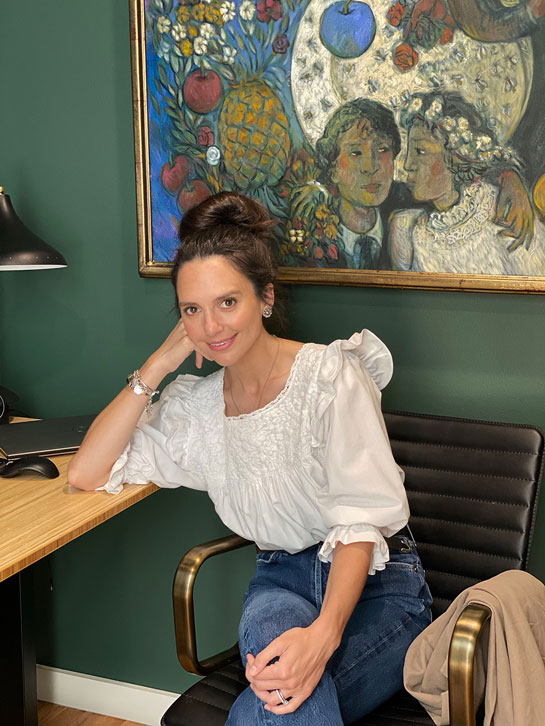 Cristina Lynch at office, photo courtesy of Mi Golondrina