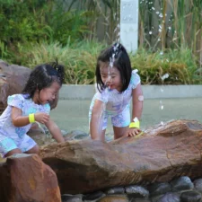 Kids playing in the fountain, photo for Summer at the Arboretum, photo courtesy of Dallas Arboretum