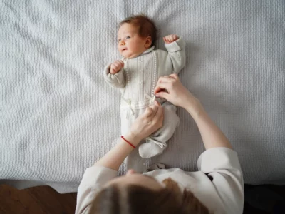 iStock image of swaddle baby, article about baby products you'll actually need to use