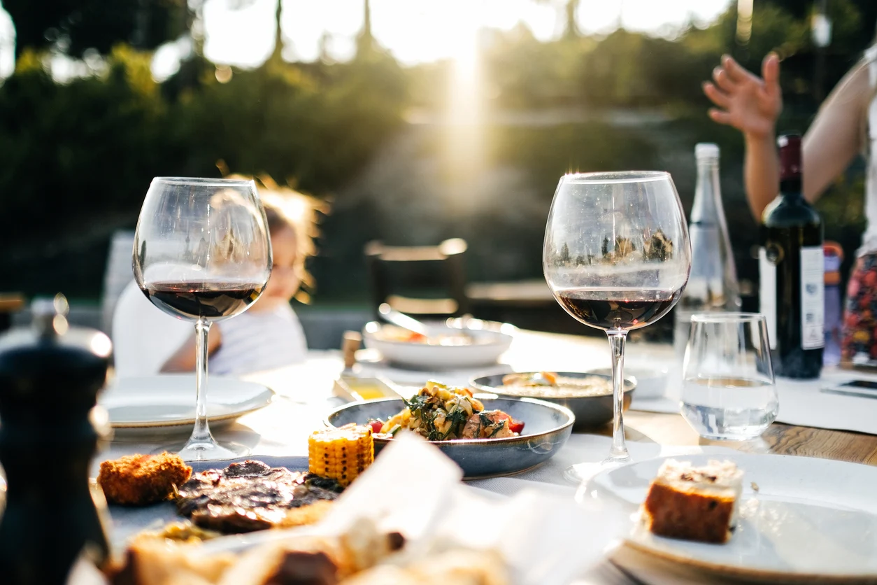 iStock image of dinner party outdoors