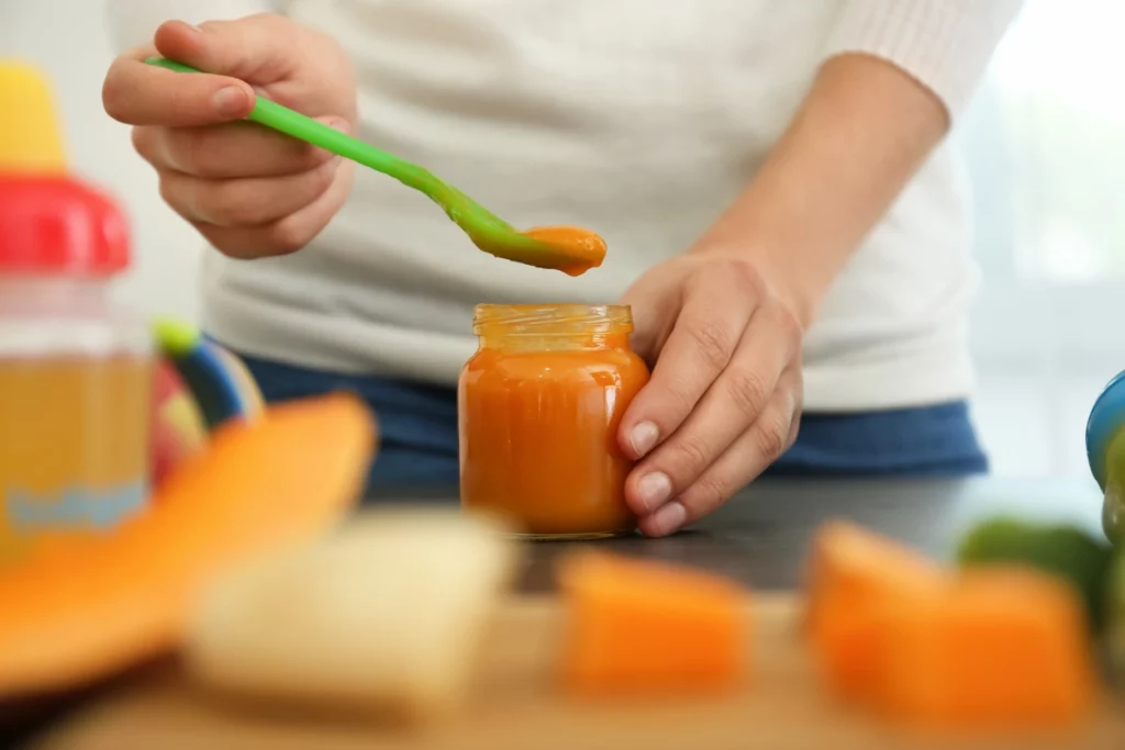 iStock image of baby food jar, for article on how to safely introduce common food allergens to your baby