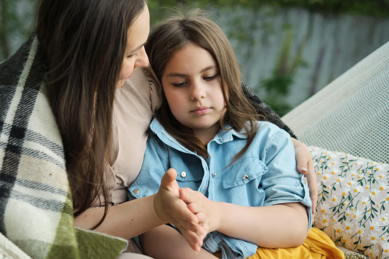 iStock image, of little girl with her mother, mental health column on what to say to your child when they complain they think they are fat