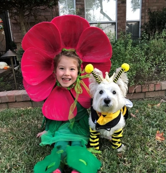 Photo of Amanda Blake's daughter, Edie, and their dog George, photo credit Amanda Blake