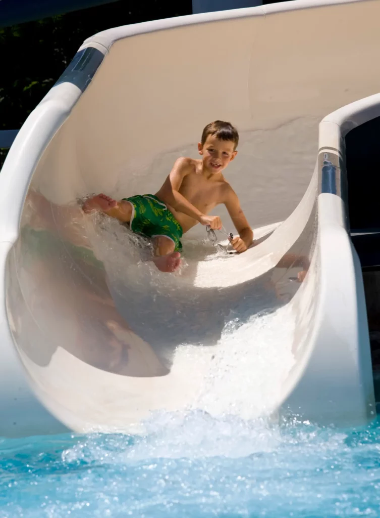 Child sliding down water slides at the Keller Pointe, for neighborhood guide to Keller, Texas