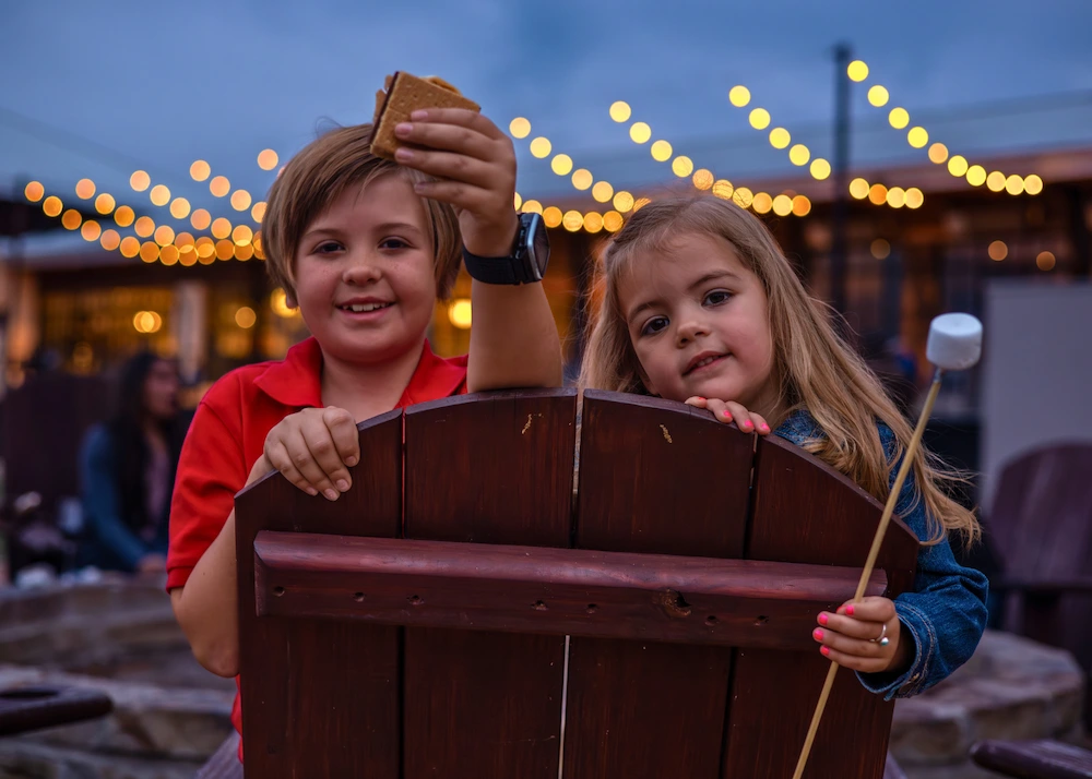 Eating s'mores around the firepit at Tapatio Springs Hill Country Resort in Boerne, Texas