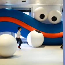 Pictured: SQUEEZED IN by Lucas Zanotto, in the exhibit Let’s Fly: Art Has No Limits, photo courtesy Balloon Museum