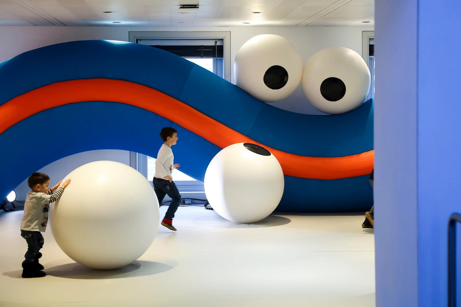 Pictured: SQUEEZED IN by Lucas Zanotto, in the exhibit Let’s Fly: Art Has No Limits, photo courtesy Balloon Museum