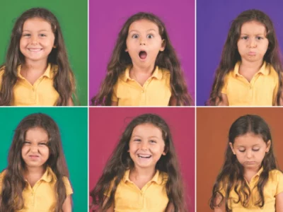 iStock image of little girl making different facial expressions to demonstrate various emotions, for an article on teaching emotional intelligence to children