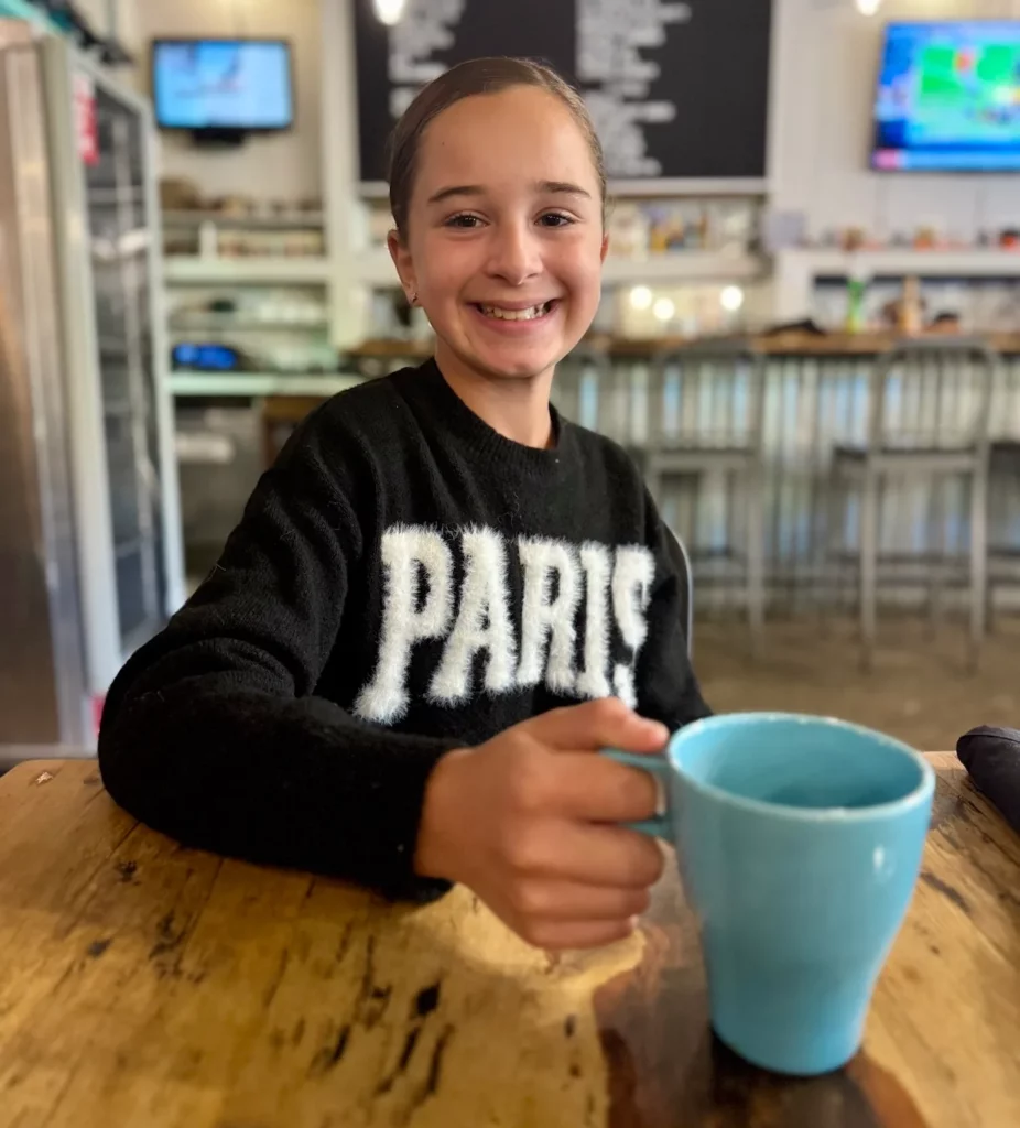 Luci with mom Tori Scott at Company Café in Dallas