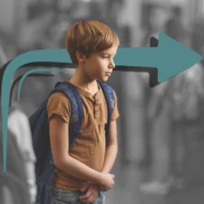 iStock image of boy with backpack, looking sad, for article on Why Your Child Doesn’t Need to Be Ahead in School to Be Doing Just Fine