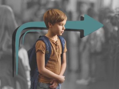 iStock image of boy with backpack, looking sad, for article on Why Your Child Doesn’t Need to Be Ahead in School to Be Doing Just Fine