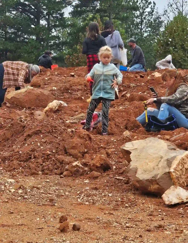 Kids digging for gemstones at Ron Coleman Mining in Arkansas