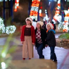 Family looking at Christmas lights at Holiday in the Park