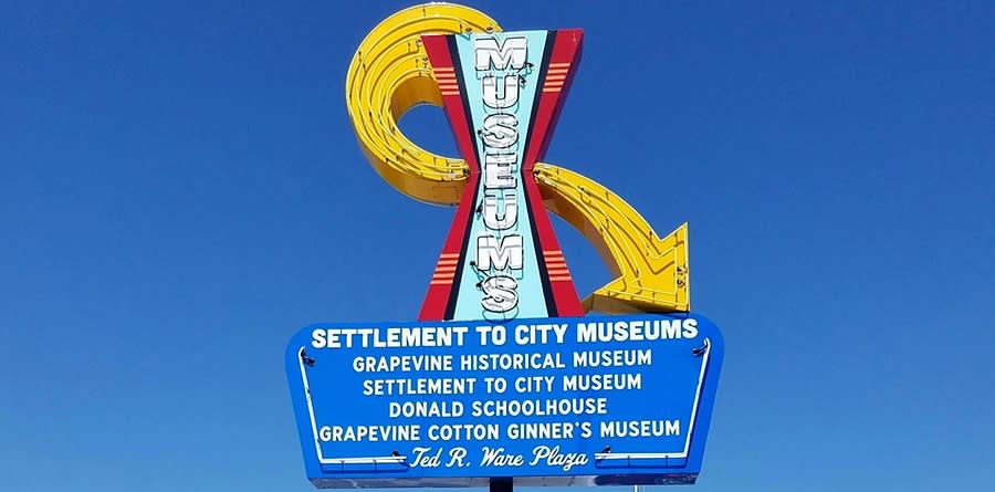 Retro sign for the Settlement to City Museum in historic Downtown Grapevine