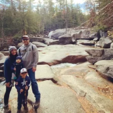 Managing editor Amanda Collins Bernier hiking with her husband and two sons